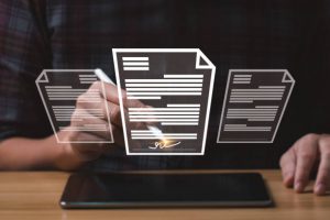 businessman uses a pen to sign electronic documents on digital documents on a virtual screen. electronic signature Technology and Document Management